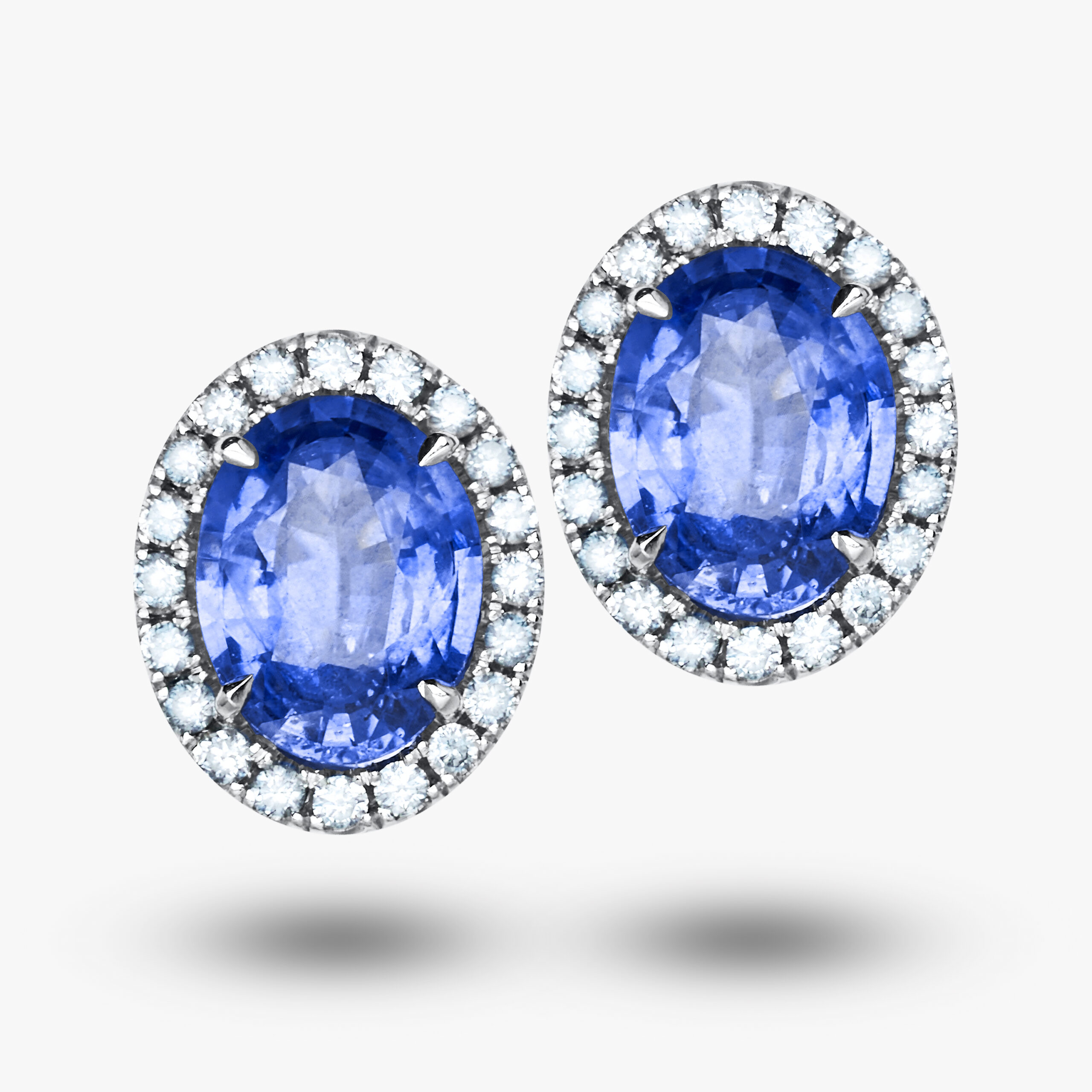 Halo Blue Oval-Cut Sapphire Stud Earrings
