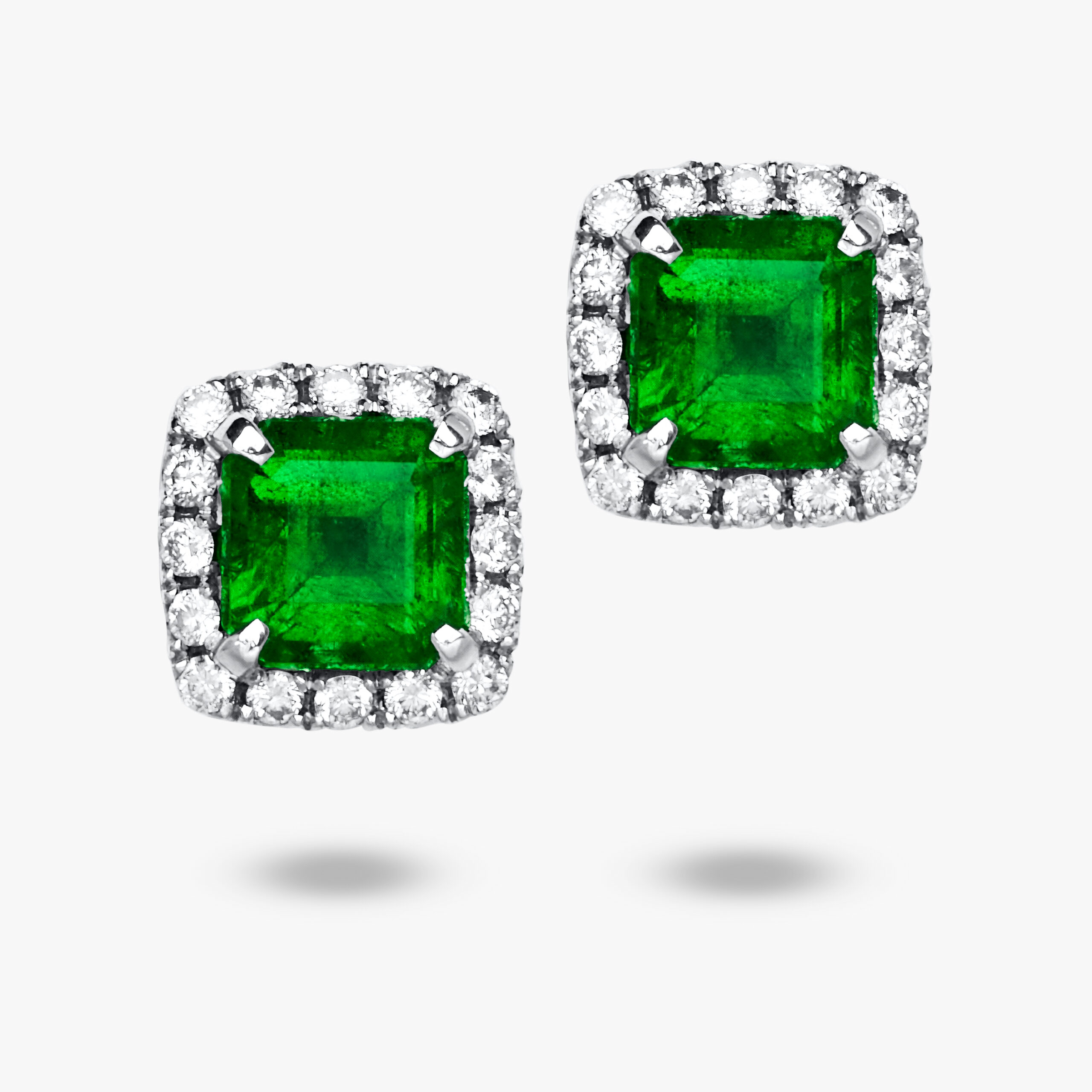 Сережки пусети зі смарагдами та діамантовим Halo