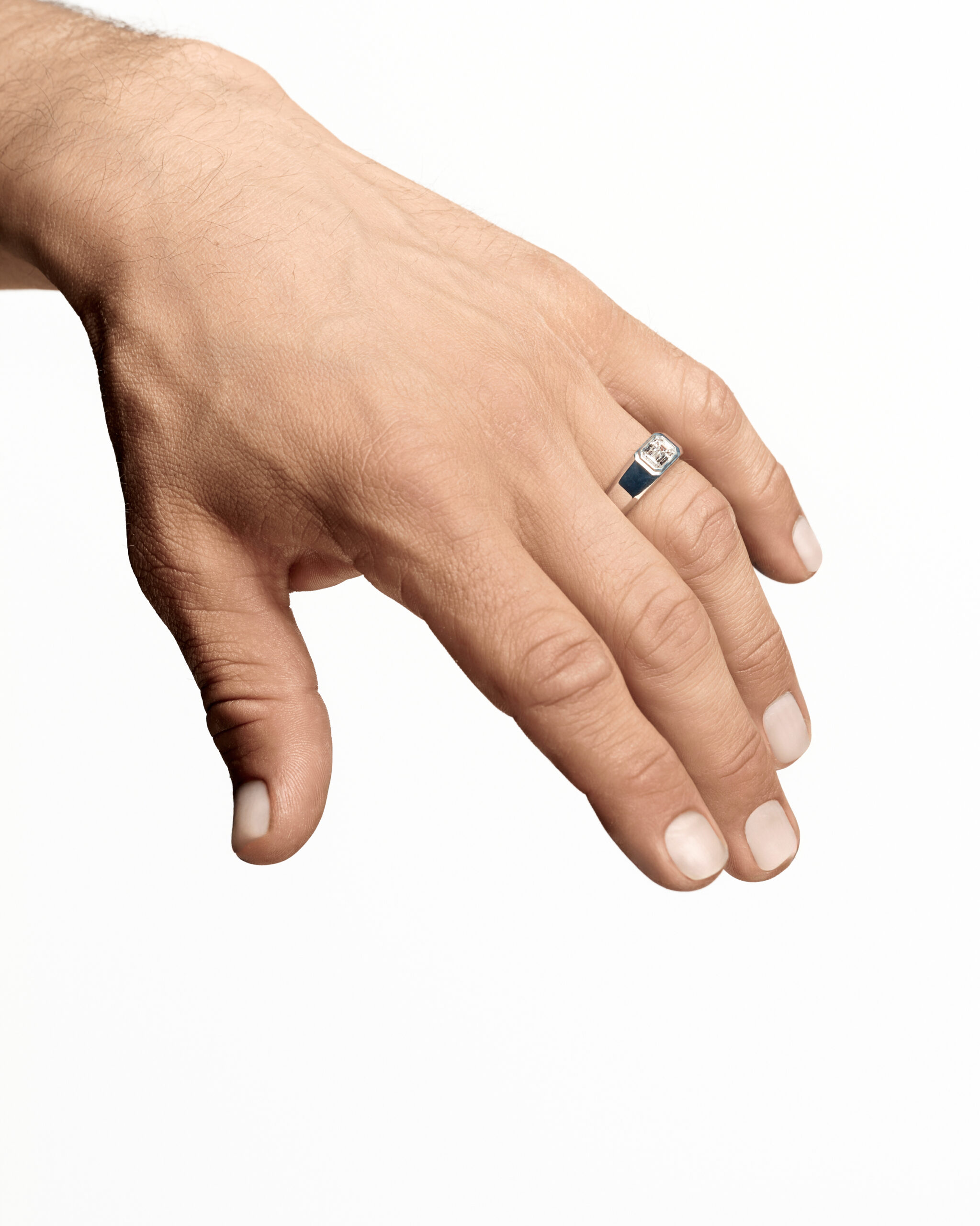 Man’s Ring with an Emerald-Cut Diamond