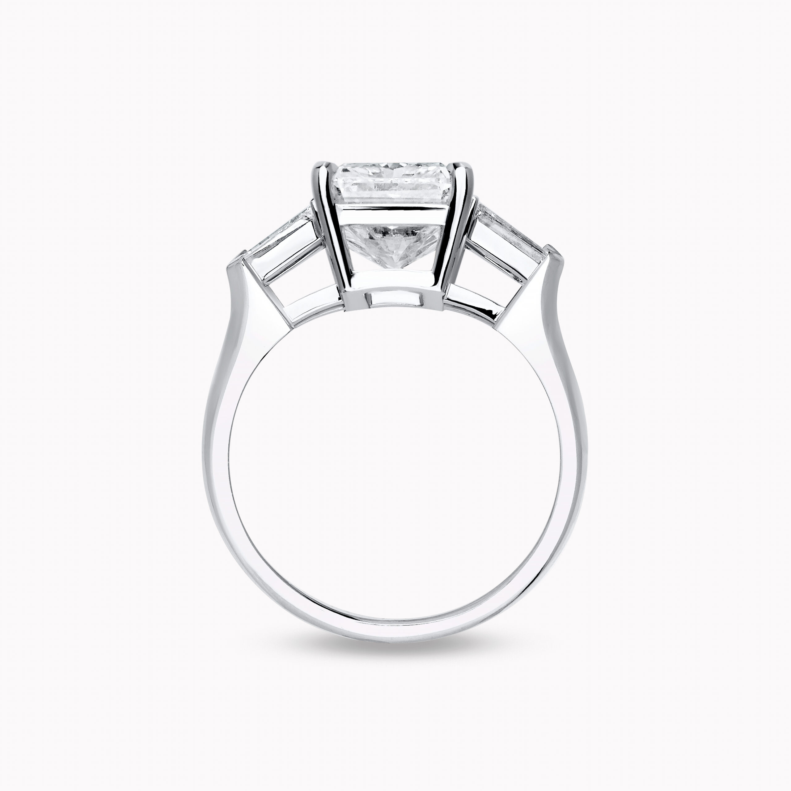 Round - Cut Diamond  Ring with Tapered Baguette Side Diamonds